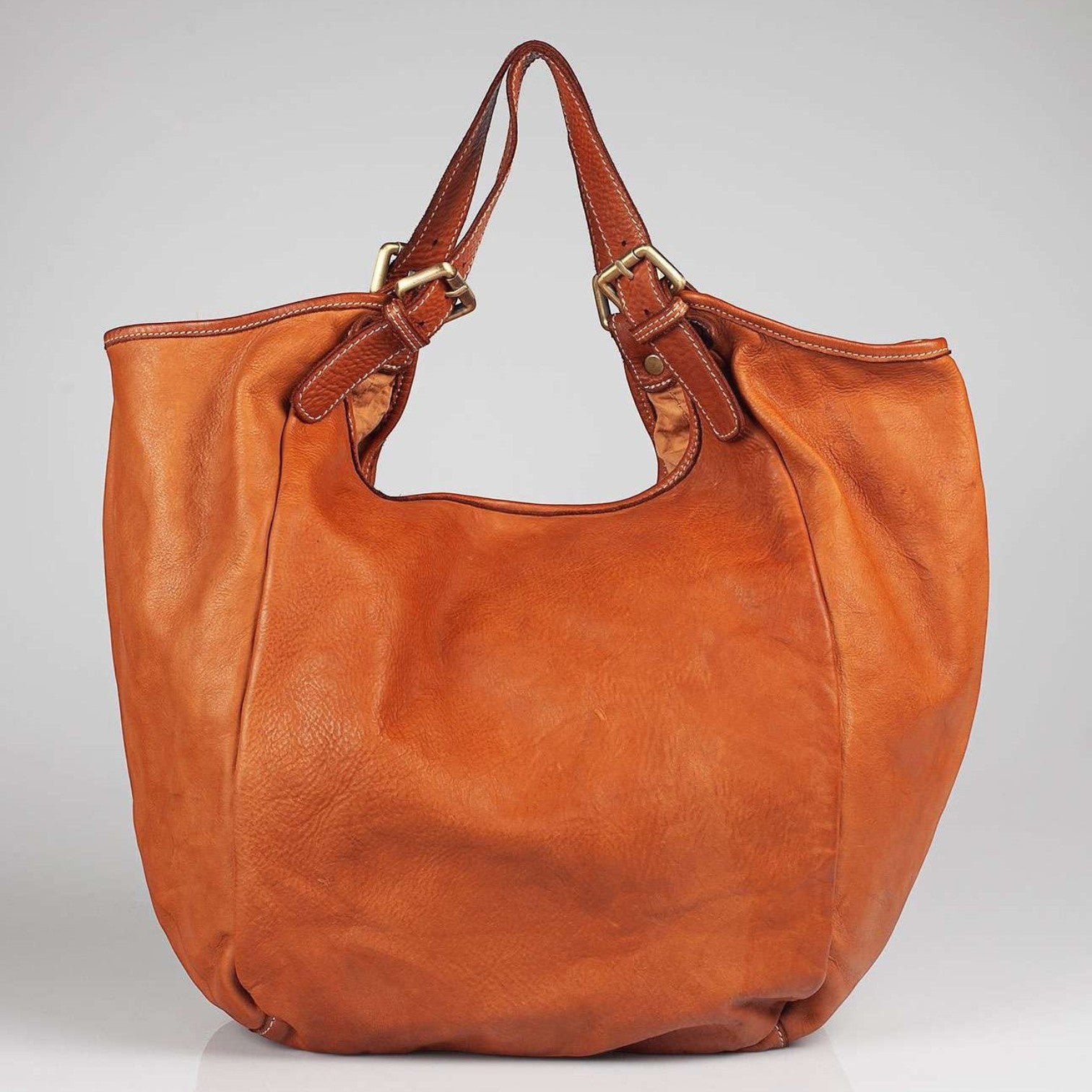 Borsa a sacca Pito’s|Bag Era in morbida pelle di vacchetta color cuoio con manici regolabili, artigianale toscana