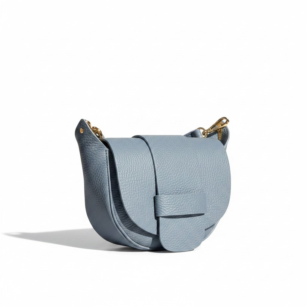 Mini borsa Pito’s|Bag Sara in vera pelle martellata azzurra con patta frontale e dettagli dorati