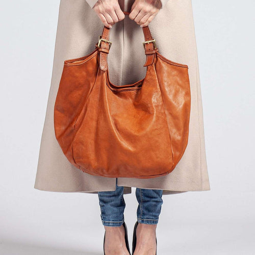 Borsa a sacca Pito’s|Bag Era in morbida pelle di vacchetta color cuoio con manici regolabili, artigianale toscana.